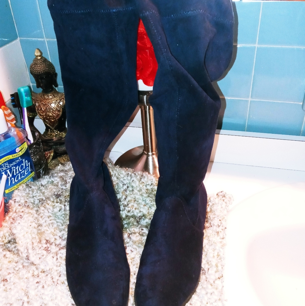Boots tie up in the back